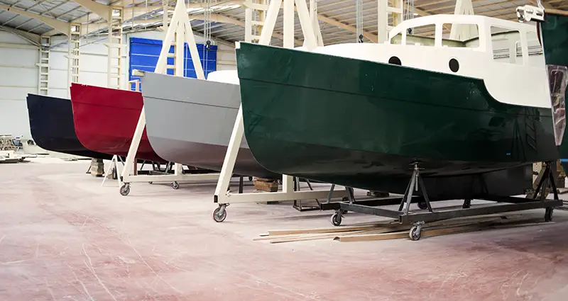 4 colorful boats