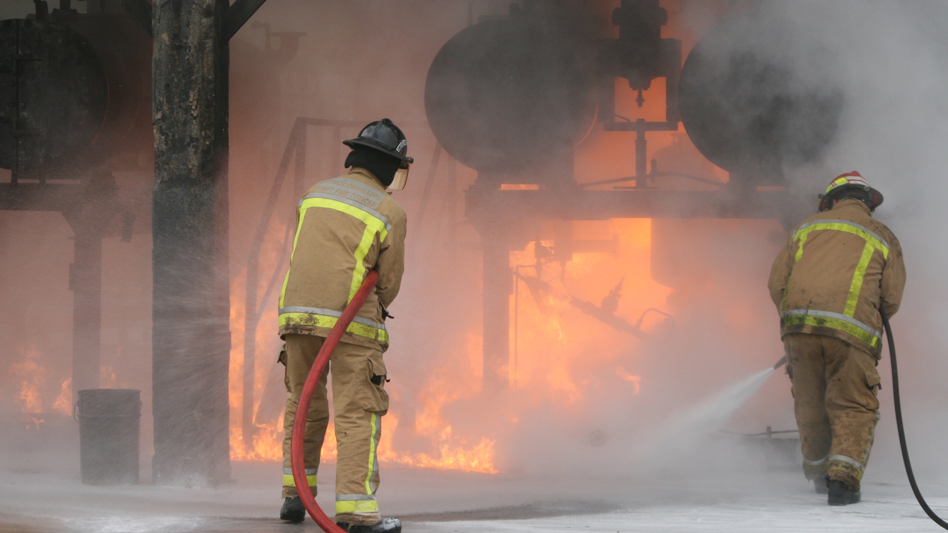 firefighters fighting a dust explosion