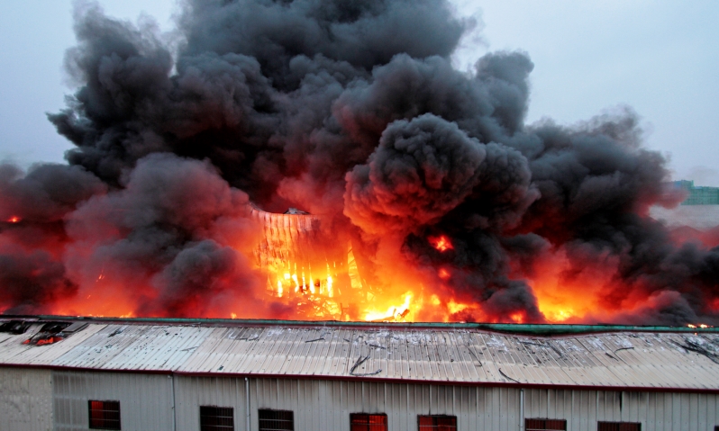 Building on fire because if an explosion, due to metalworking dust explosion.