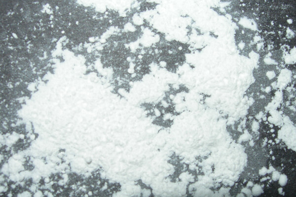A pile of talc powder dust on the ground.