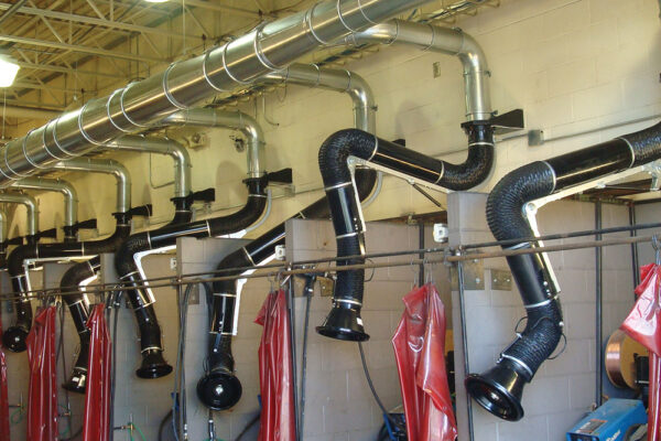 fume arms at welding stations