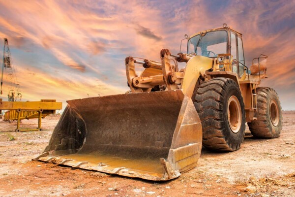 Bulldozer on construction site that was manufactured in a dust free environment.