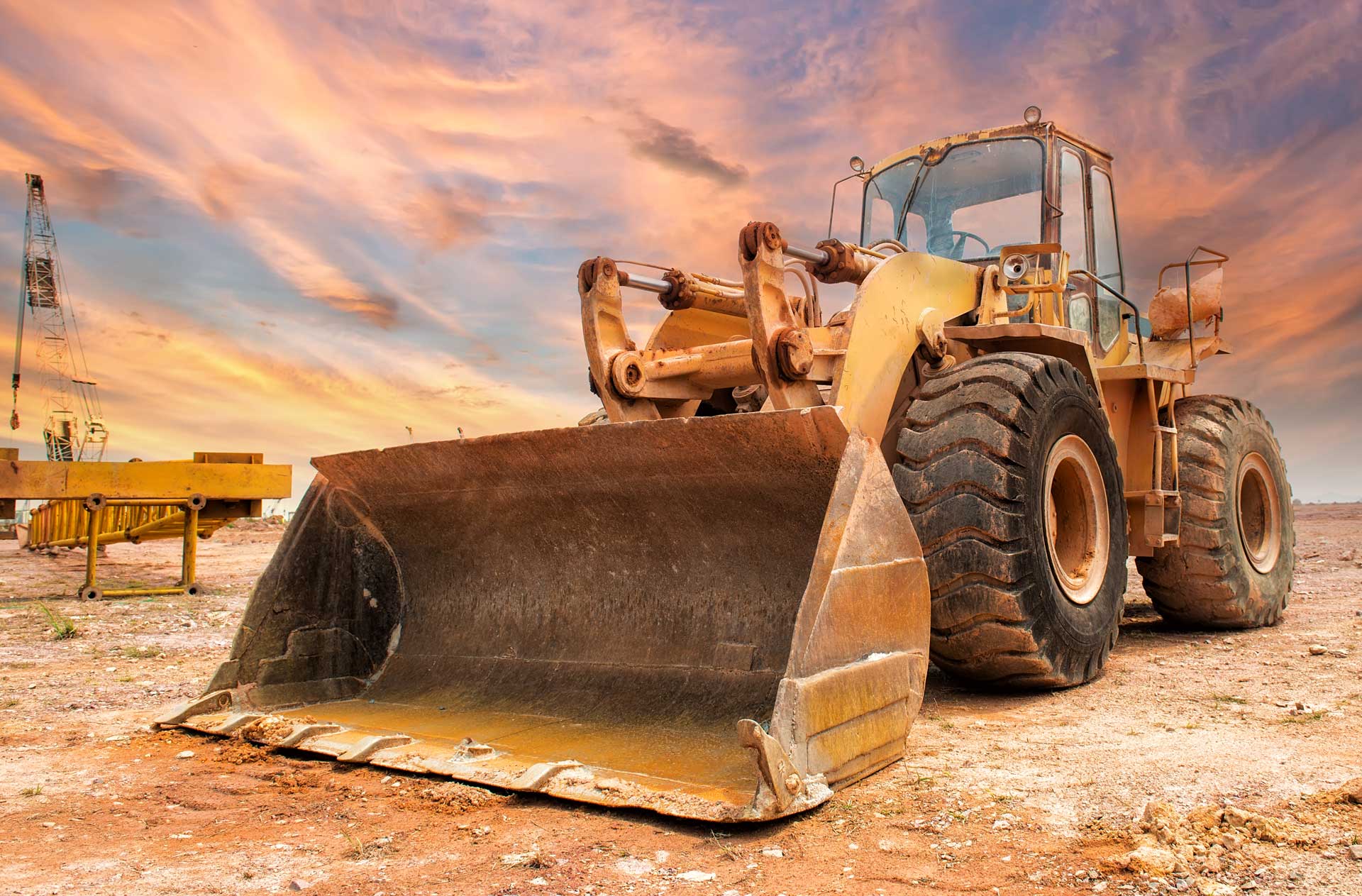 Bulldozer on construction site that is dust-free, due to heavy equipment dust collection solutions